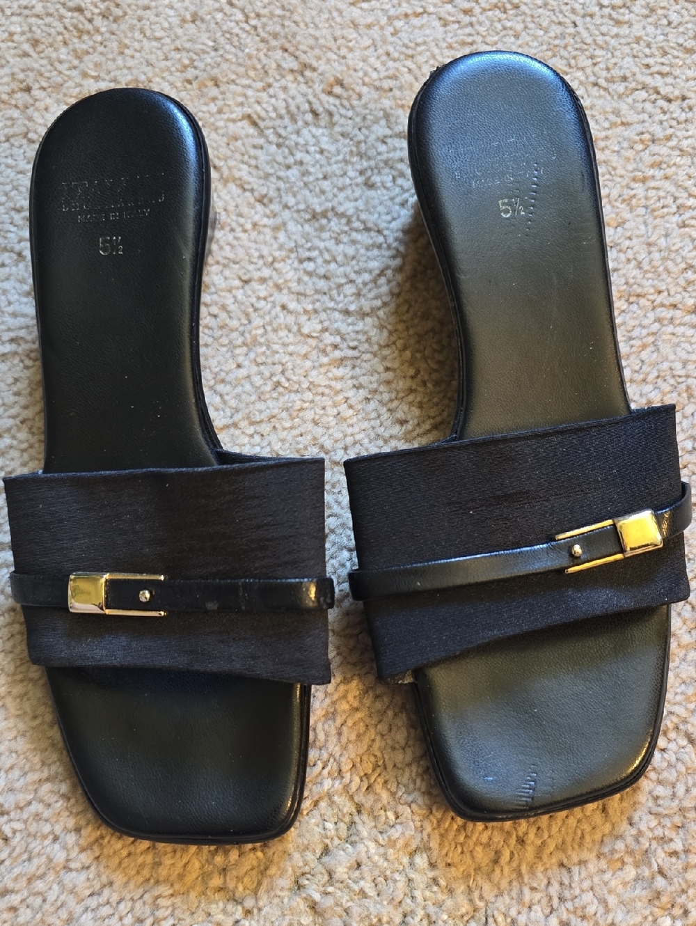Stuart Weitzman Black Slide Mules with Gold Buckle